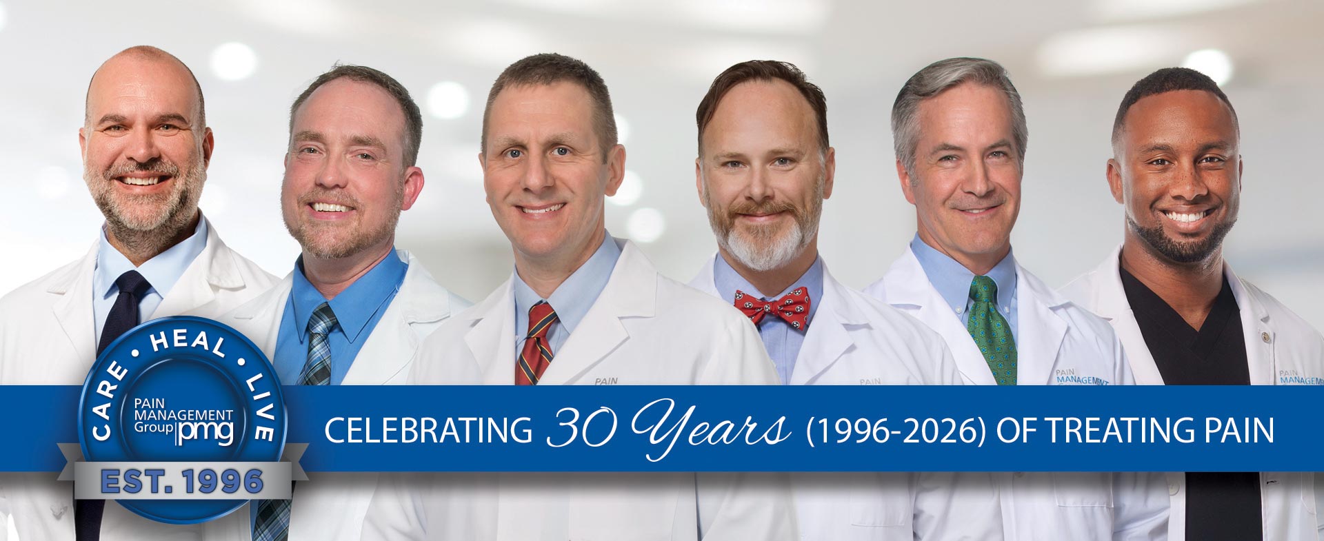 The physicians of The Pain Management Group in white coats